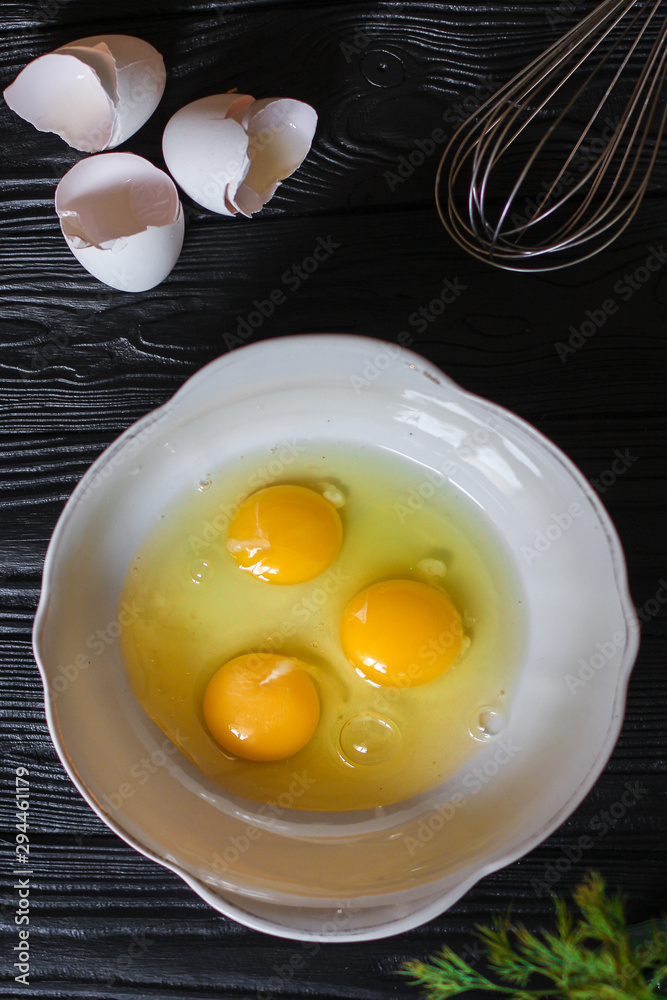 dough liquid, raw ingredients (eggs, flour, sugar, salt and more) menu concept. food background. copy space. Top view dough liquid, raw ingredients (eggs, flour, sugar, salt and more) menu concept. food background. copy space. Top view