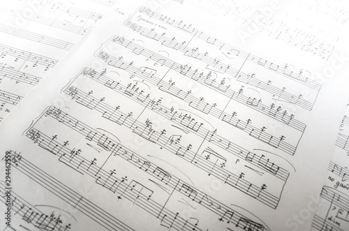 Sheet music with manual inscriptions close up