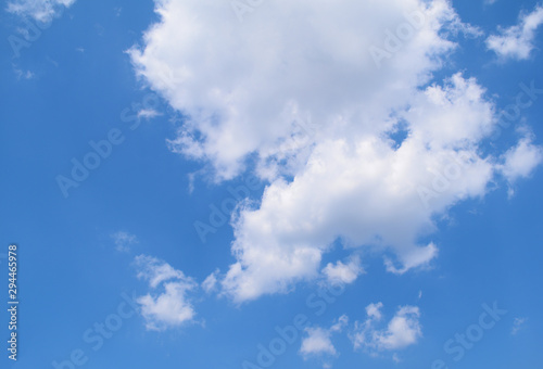 Bottom view of the blue sky and white clouds. Background  texture.