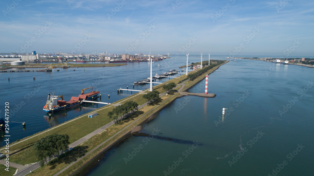 Port of Rotterdam. Botlek. Oil refinery plant from industry zone, Aerial view oil and gas industrial, Refinery factory oil storage tank and pipeline steel