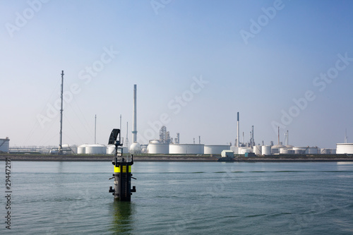 Berth - a place near the shore for mooring a vessel or boats in the Port of Rotterdam photo