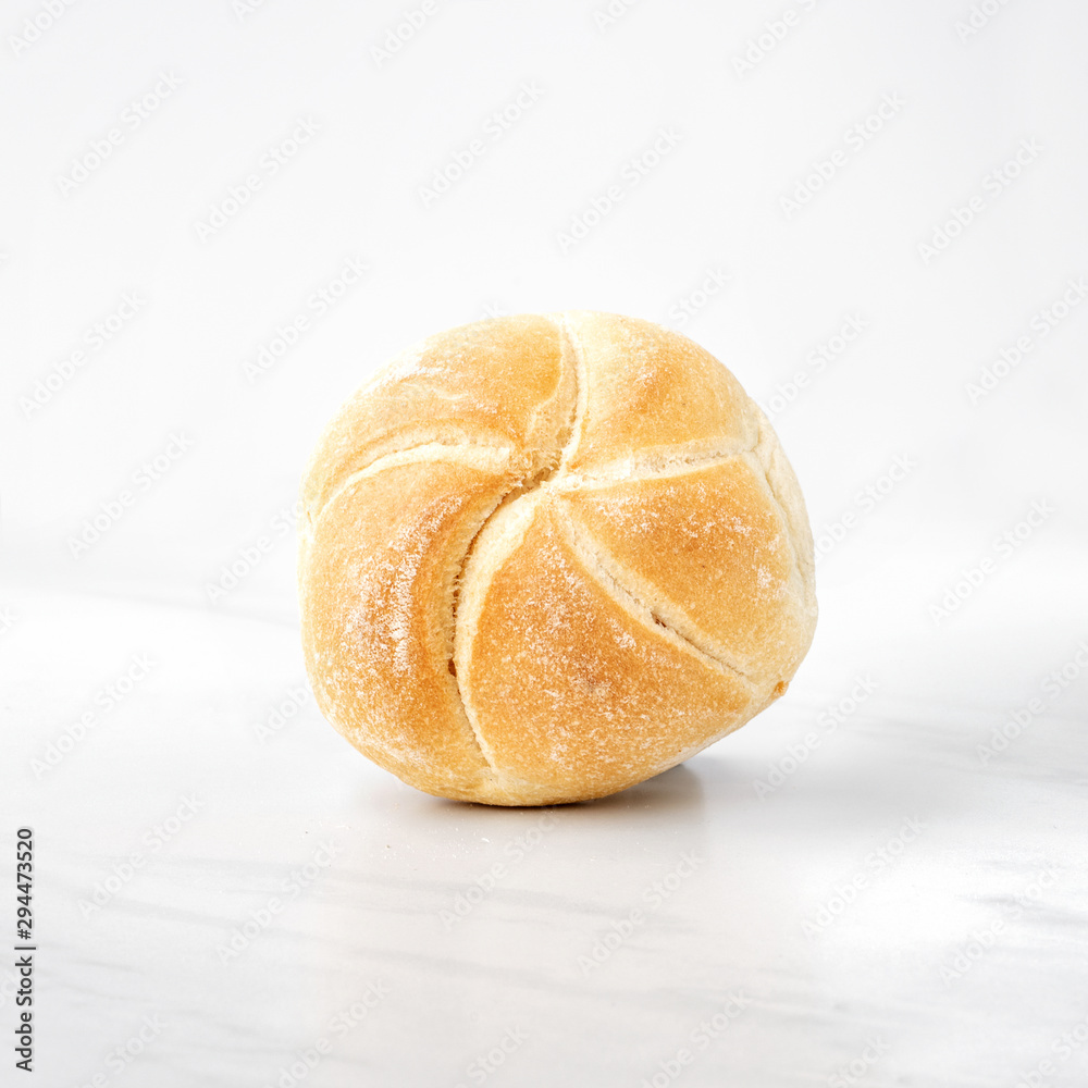 Close-up view of a single whole bread roll 
