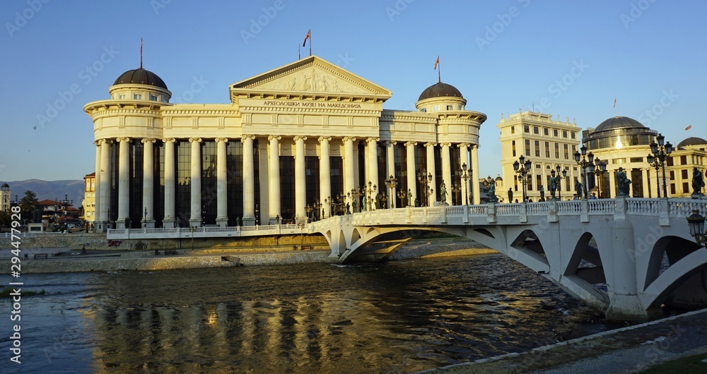 building in skopje at river during autumn