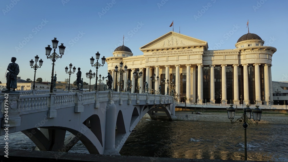Fototapeta premium building in skopje at river during autumn