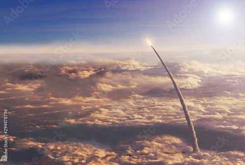 Fototapeta Naklejka Na Ścianę i Meble -  Space shuttle in the upper atmosphere. Elements of this image were furnished by NASA