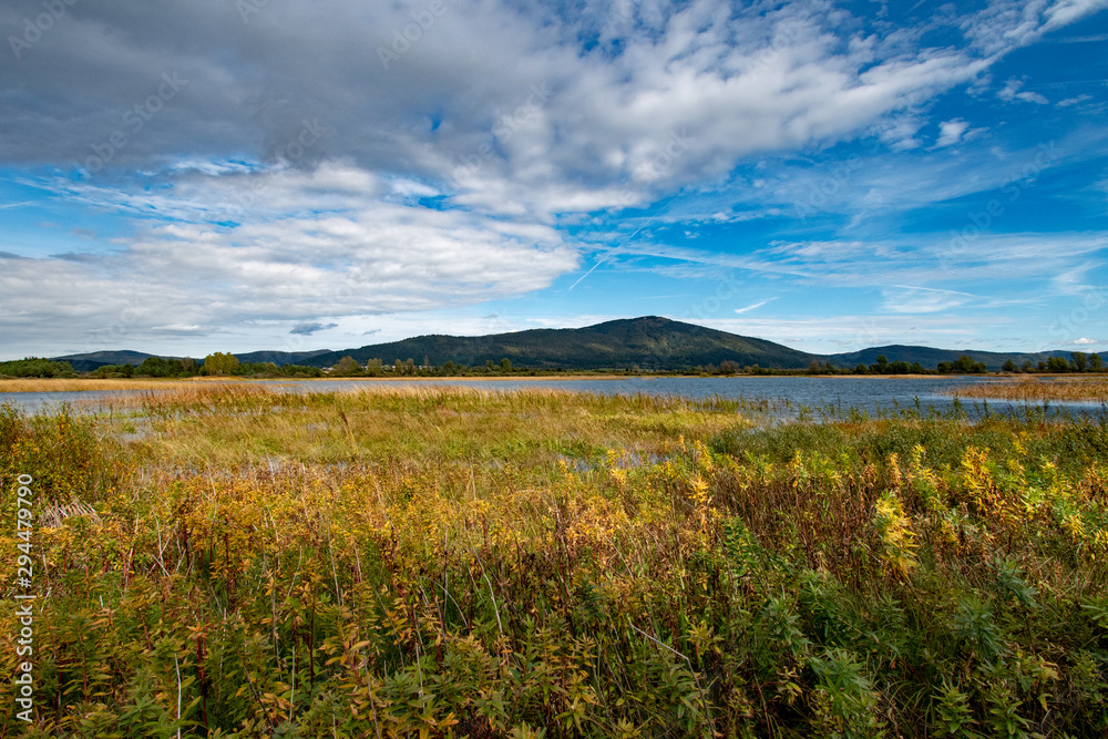 Lake Cerknica (Slovene: Cerknisko Jezero, Cerkniško jezero ) is an intermittent lake on Cerknica Polje ( Cerknisko Polje ) an biggest karst phenomena in Slovenia. During autumn at high waters. Lake Cerknica (Slovene: Cerknisko Jezero, Cerkniško jezero ) is an intermittent lake on Cerknica Polje ( Cerknisko Polje ) an biggest karst phenomena in Slovenia. During autumn at high waters.