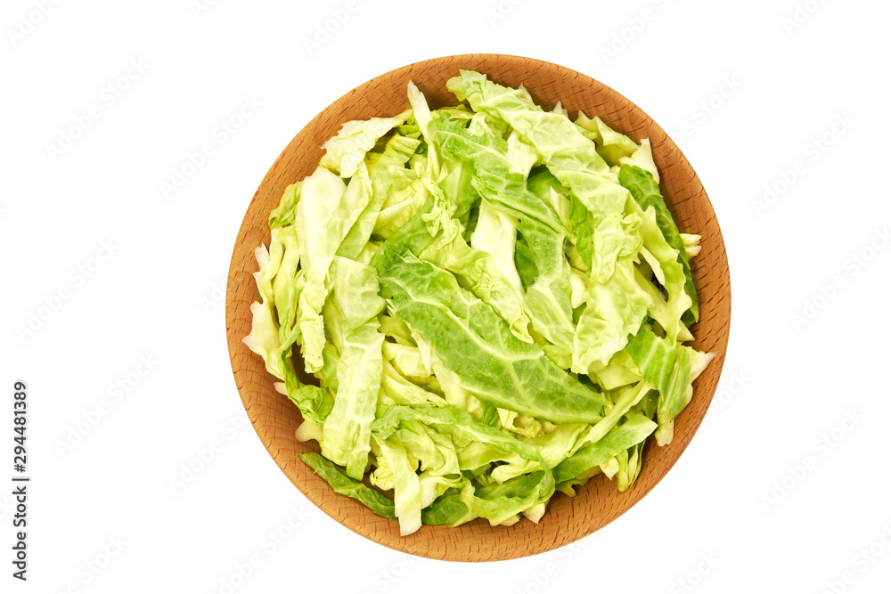 Wooden bowl with сhopped savoy cabbage isolated on white background. Top view. Wooden bowl with сhopped savoy cabbage isolated on white background. Top view.