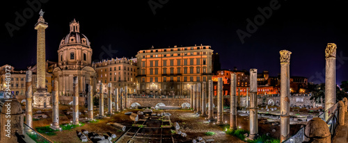 Panoramic view of Trajan forum at night in Rome, Italy photo