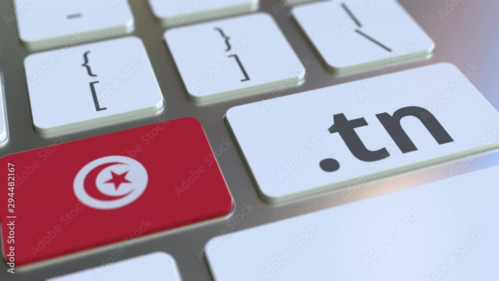 Tunisian domain .tn and flag of Tunisia on the buttons on the computer keyboard. National internet related 3D animation Tunisian domain .tn and flag of Tunisia on the buttons on the computer keyboard. National internet related 3D animation