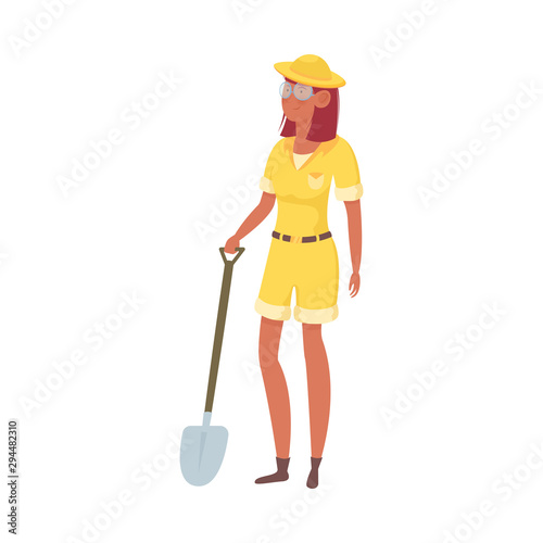 Woman archaeologist in yellow clothing holding shovel vector illustration