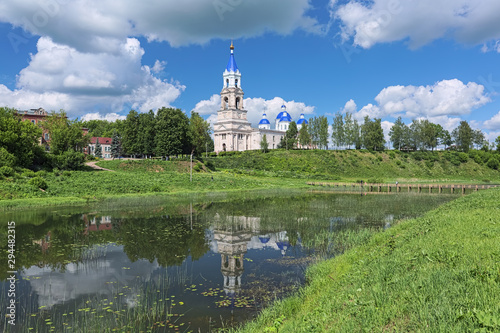 Kashin, Russia. View of Resurrection Cathedral from the shore of Kashinka river. The present cathedral was built in 1796-1804. The bell tower with height of 79 meters was built in 1855-1867. photo