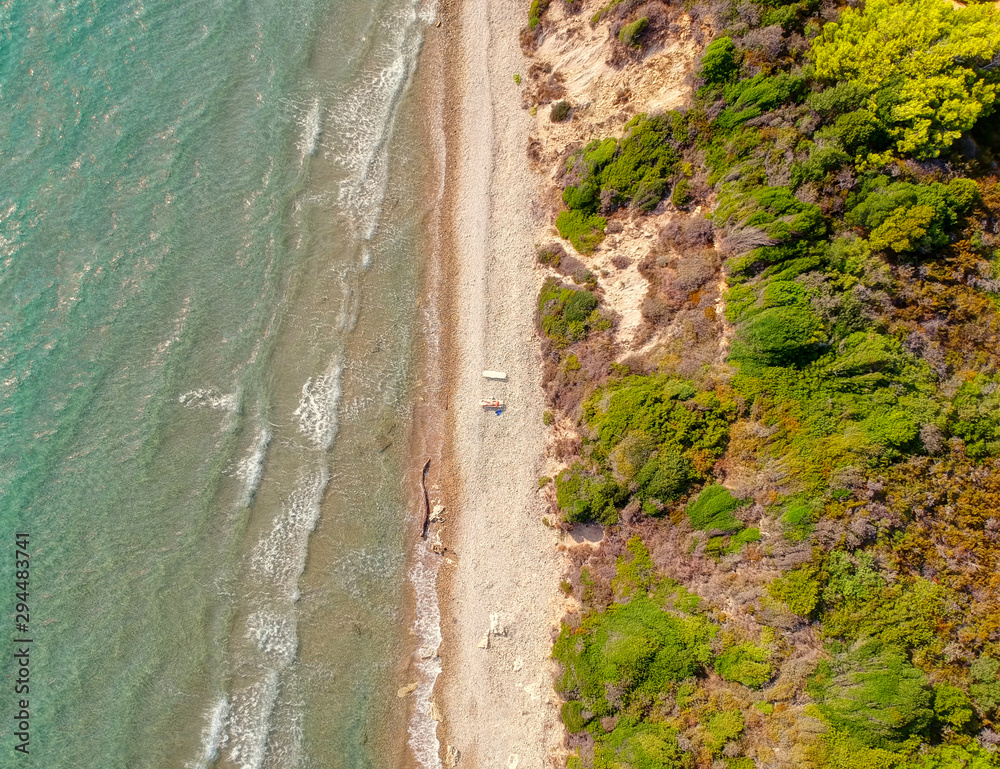 Paradise sunny tropical beach above aerial drone view. Wave on beach from above Drone photography. Wild beach on pacific ocean above view from drone. Paradise sunny tropical beach above aerial drone view. Wave on beach from above Drone photography. Wild beach on pacific ocean above view from drone.