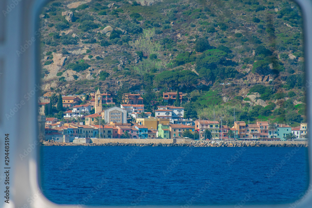 View of Giglio Porto GR, Italy on Giglio Island from the Tyrrhenian Sea on the  ferry from Porto Santo Stefano
