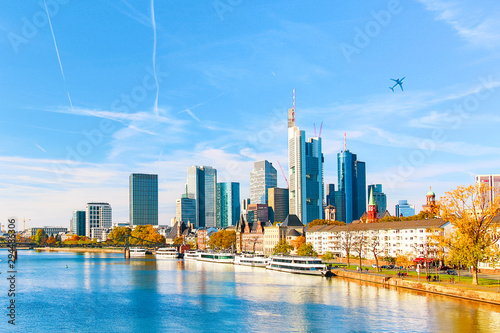 Skyline cityscape of Frankfurt  Germany during sunny day with a plane. Frankfurt am Main is a financial capital of Europe.