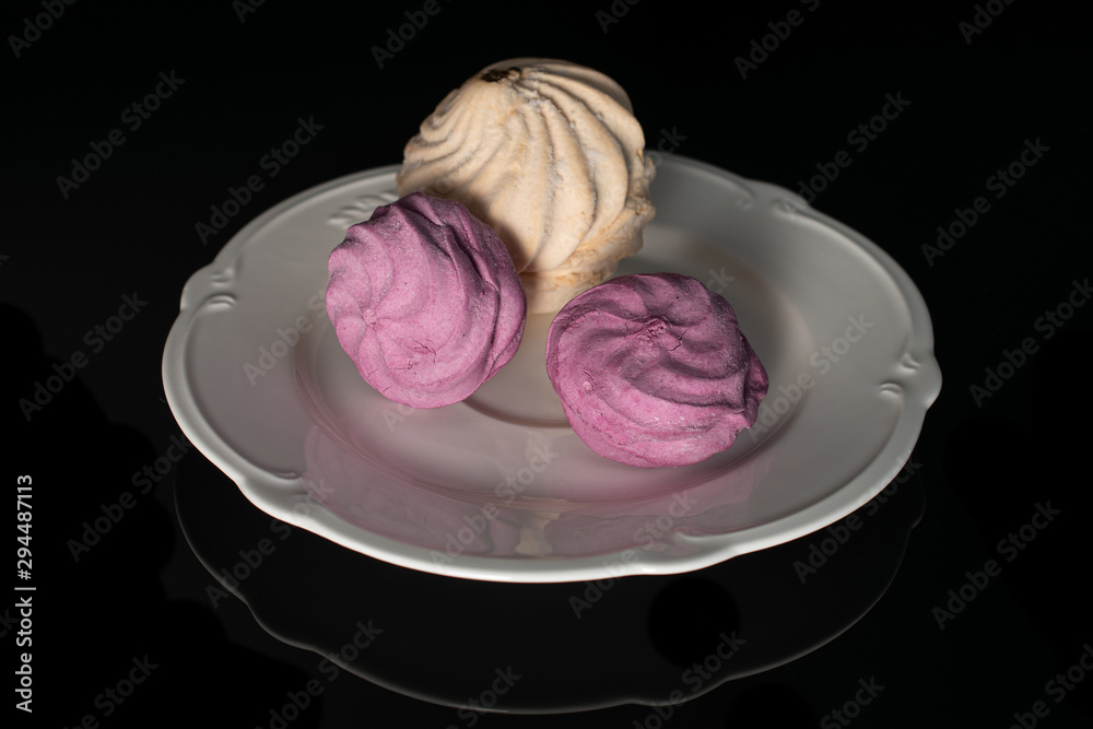 custom made wallpaper toronto digitalGroup of three whole airy fresh pastel zefir on white plate isolated on black glass