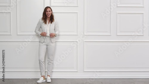 Laughing Businesswoman In White