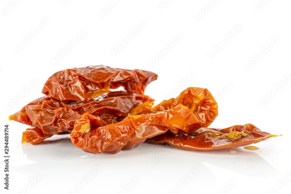 Lot of slices of dry red cherry tomato isolated on white background Lot of slices of dry red cherry tomato isolated on white background