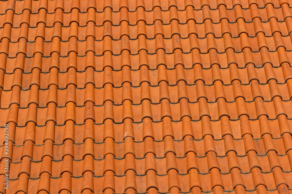 A roof tiled with imbrices and tegulae. Photo in perspective A roof tiled with imbrices and tegulae. Photo in perspective