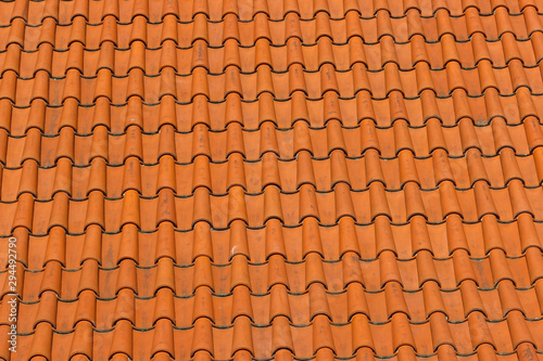 A roof tiled with imbrices and tegulae. Photo in perspective