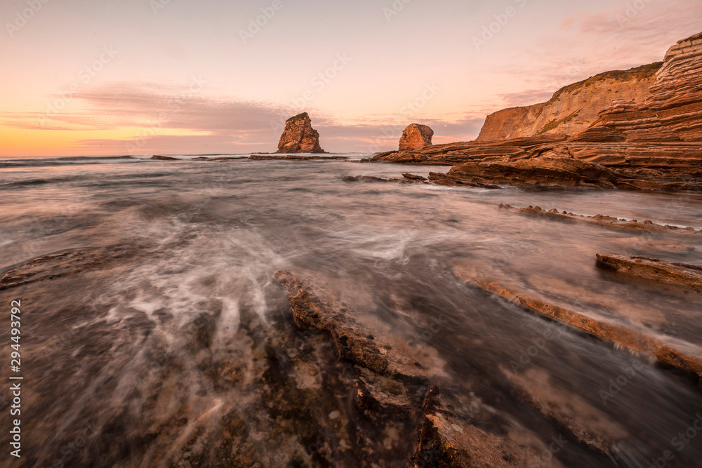 Long exposure at low tide on the rocks called two sisters of Hendaye. France