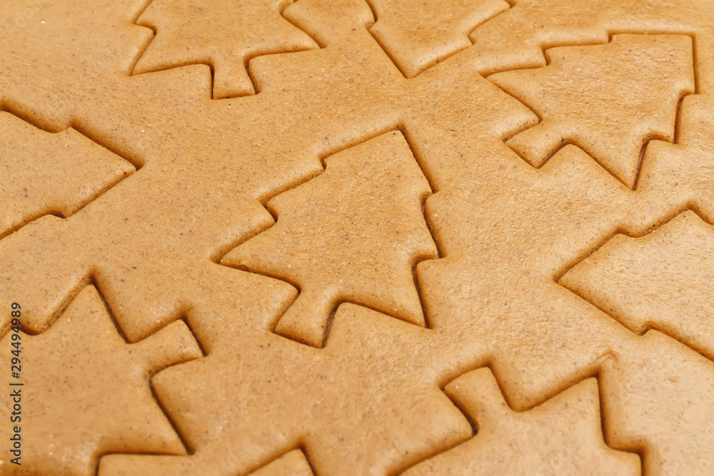 Christmas gingerbread dough cookie background. Christmas trees baking pattern