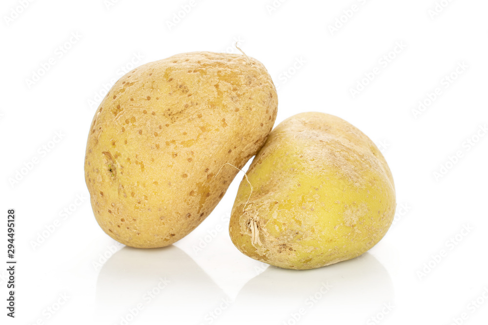Group of two whole raw brown potato isolated on white background Group of two whole raw brown potato isolated on white background