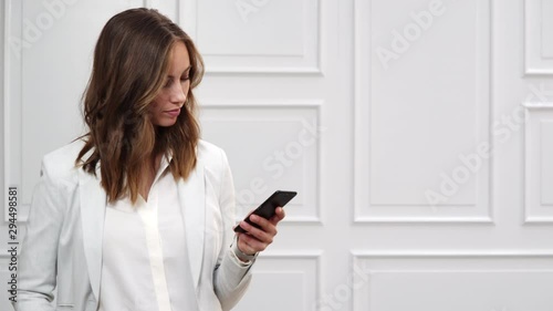 Businesswoman Texting On Phone