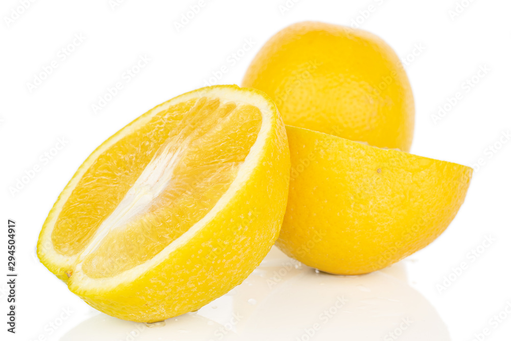 Group of one whole two halves of fresh bright orange isolated on white background Group of one whole two halves of fresh bright orange isolated on white background