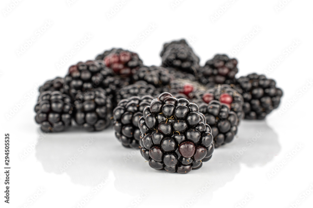 Lot of whole fresh black blackberry heap isolated on white background Lot of whole fresh black blackberry heap isolated on white background