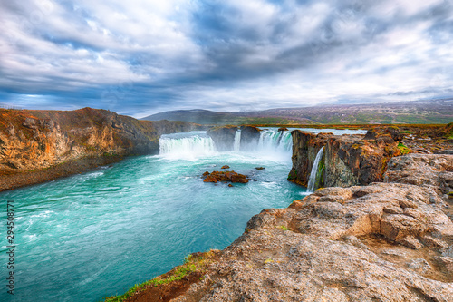 Incredible landscape scene of powerful Godafoss waterfall.