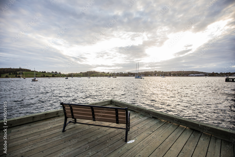 Chair with the beautiful view on the ocean in Lunenburg Nova Scotia Chair with the beautiful view on the ocean in Lunenburg Nova Scotia