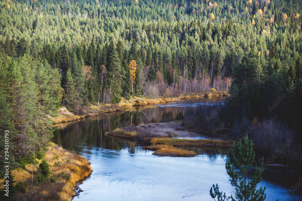 Autumn view of Oulanka National Park landscape, during hiking, a finnish national park in the Northern Ostrobothnia and Lapland regions of Finland Autumn view of Oulanka National Park landscape, during hiking, a finnish national park in the Northern Ostrobothnia and Lapland regions of Finland