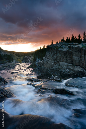 Swiftcurrent Lake river flowing towards the sunrise at East Glacier, Montana. © Roberto