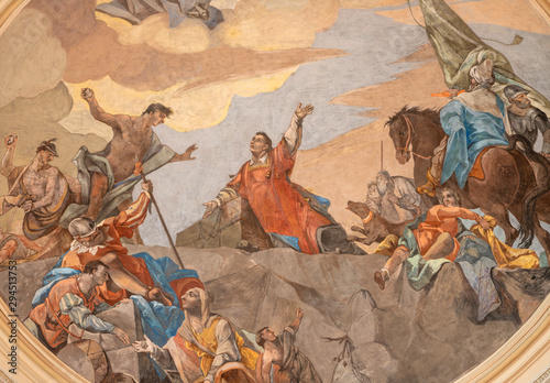 MALCESINE, ITALY - JUNE 13, 2019: The ceiling fresco of Stoning of St. Stephen in church Chiesa di Santo Stefano by Odoardo Perini (1750). photo