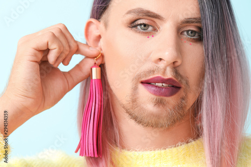 Portrait of young transgend...