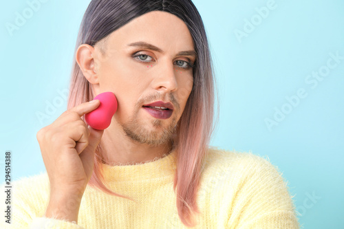 Portrait of young transgend...