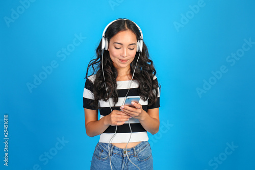 Beautiful Asian woman liste...