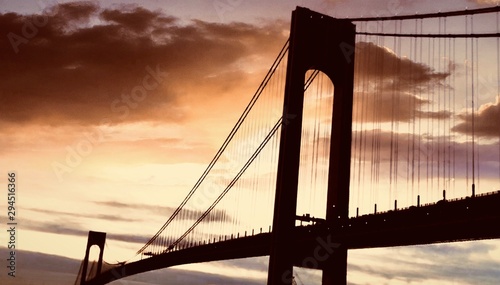 Fototapeta Naklejka Na Ścianę i Meble -  Suspension bridge in the sunset