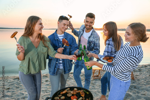 Friends at barbecue party n...