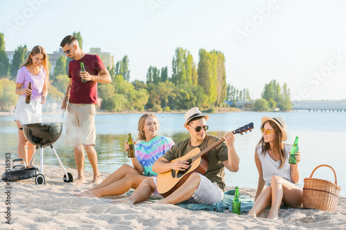 Friends at barbecue party n...