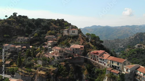 Wallpaper Mural AERIAL: Drone panoramic above the old village of Savoca in Sicily Italy, with its picturesque castle and a wonderful view of the mountains and the sea Torontodigital.ca