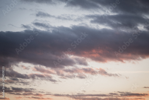 Light and dark sunset clouds © acreamer