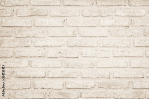 Wall cream brick wall texture background in room at subway. Brickwork stonework interior  rock old clean concrete grid uneven abstract weathered bricks tile design  horizontal architecture wallpaper.