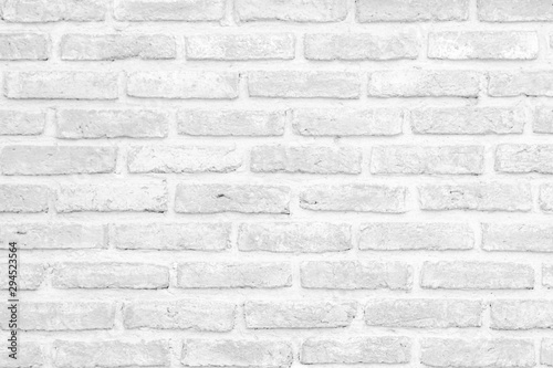 Wall white brick wall texture background in room at subway. Brickwork stonework interior, rock old clean concrete grid uneven abstract weathered bricks tile design, horizontal architecture wallpaper.
