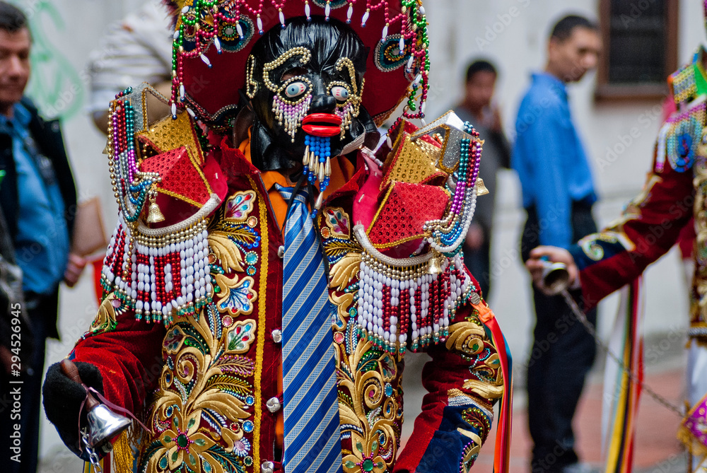 Dancer of dance of the negritos of the city of huanuco, during pasacalle in Peru.