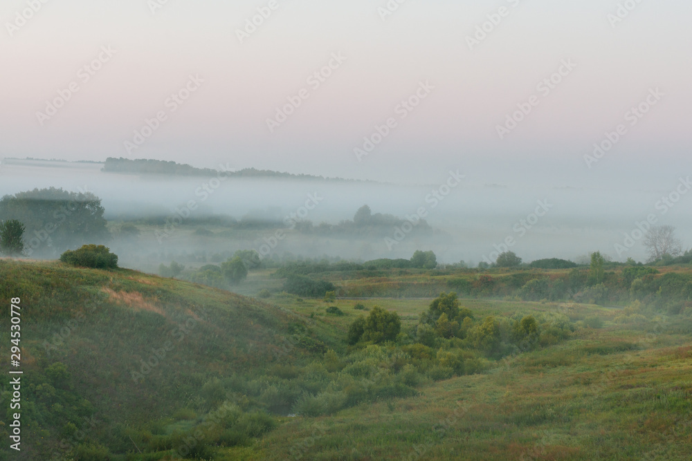 Foggy landscape in the early morning