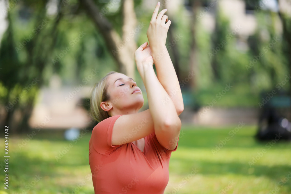 portrait of cheerful women with sportswear doing yoga pose at outdoor portrait of cheerful women with sportswear doing yoga pose at outdoor