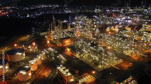Wallpaper Mural Aerial view night light oil terminal is industrial facility for storage of oil and petrochemical. oil manufacturing products ready for transport and business transportation. power electric plant. Torontodigital.ca