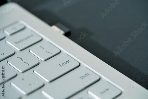 closeup of silver laptop keyboard