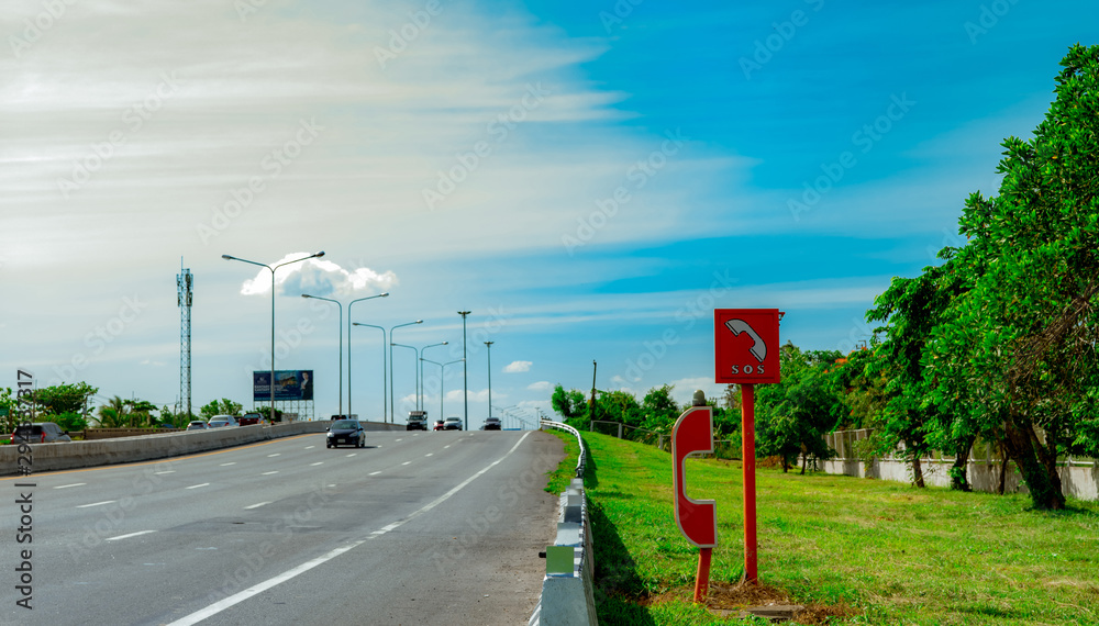 Emergency SOS telephone installed at roadside. Highway SOS call box